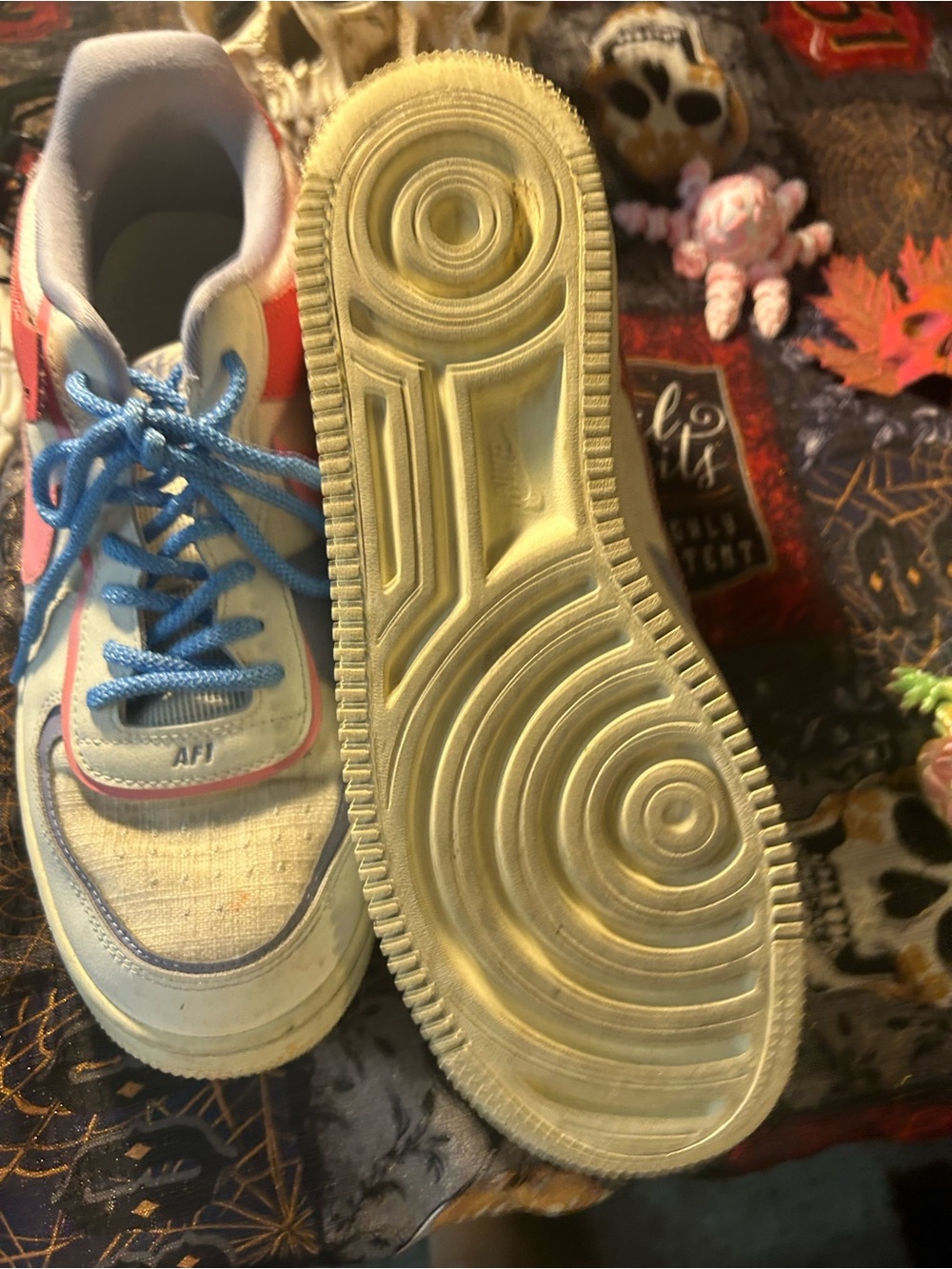 Nike White and Blue Athletic Shoes with Pink Accent
